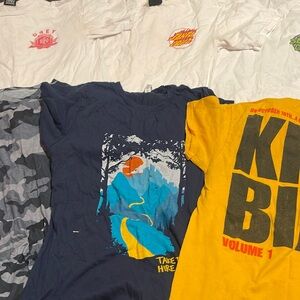 Assorted tees all small! Great for kids or that female